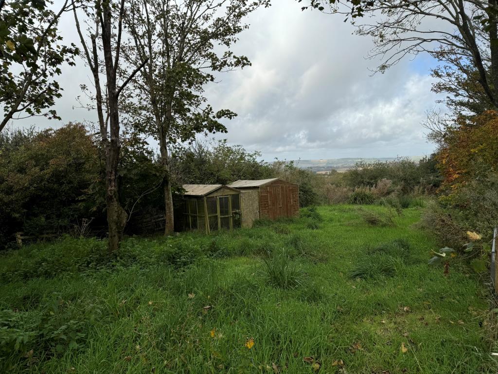 Lot: 89 - BARN AND 5.91 ACRES OF GRAZING IN AN ELEVATED LOCATION WITH VIEWS - View of grass outbuildings and view beyond
